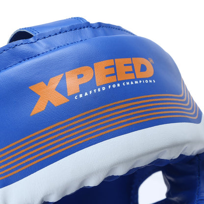 Xpeed XP105 boxing headguard with sparring design, padded interior, and adjustable straps for protection during training.