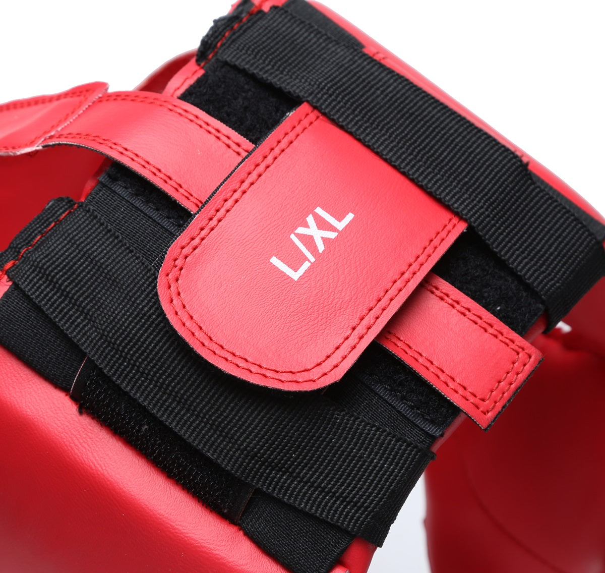 Red XPEED XP105 Spar Headguard for boxing, padded head protection with adjustable straps and ventilation, designed for training and sparring.