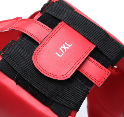Red XPEED XP105 Spar Headguard for boxing, padded head protection with adjustable straps and ventilation, designed for training and sparring.