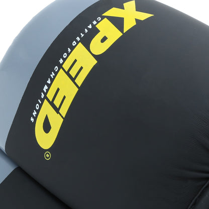 Yellow Xpeed XP1504 MMA gloves with padded wrist support and grip-enhancing design for striking and training.
