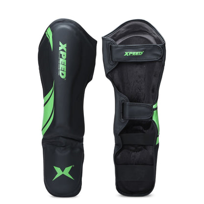 Green Xpeed XP1806 Shin Pad for MMA and martial arts, featuring durable premium PU padding and adjustable straps.