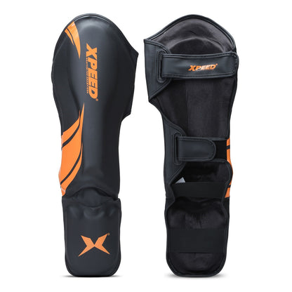 Orange Xpeed XP1806 Shin Pad for MMA and martial arts, featuring premium PU material and protective design for combat sports.