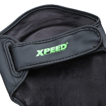 Green Xpeed XP1806 MMA shin pad with padded leather exterior for martial arts protection and comfort.