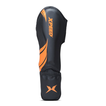 Orange Xpeed XP1806 Shin Pad for MMA and martial arts, made of premium PU material, offers protection and comfort during training.