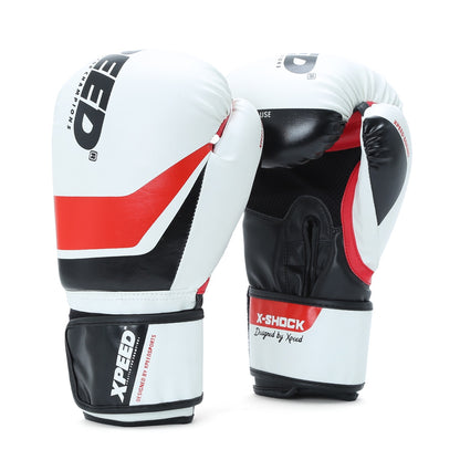 Red XPEED XP2473 X-Shock boxing glove with padded wrist support and secure velcro strap for training and sparring.