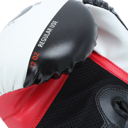 Red XPEED XP2473 X-Shock boxing glove with padded wrist support and ergonomic design for training and competition.