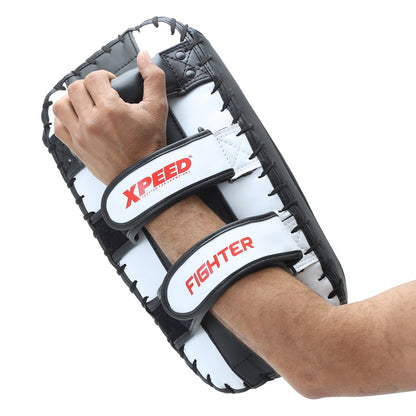 Xpeed XP2489 Fighter Thai pad for kickboxing and MMA training, showing a sturdy padded striking shield with adjustable straps.