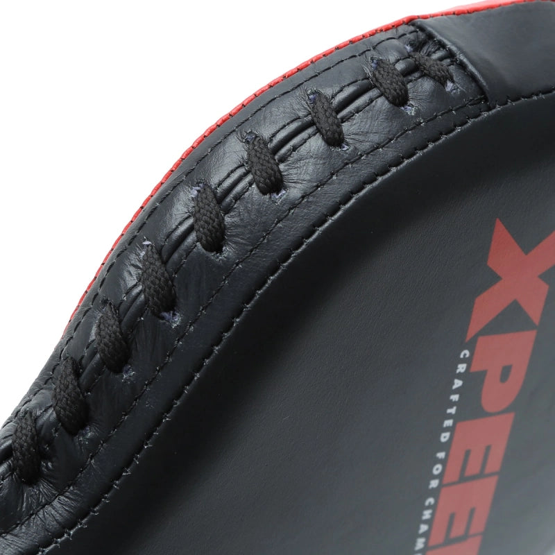 Xpeed XP2493 Fighter Fan Pad for professional kicking and precision speed training, featuring durable padding and focus mitt design.