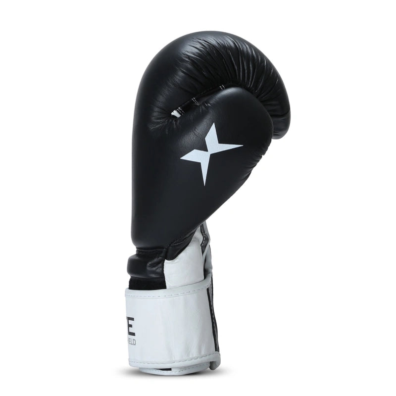 Xpeed XP2805 Elite professional boxing gloves in black with padded palms and adjustable wrist strap for optimal grip and protection.