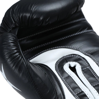 Xpeed XP2805 Elite professional boxing gloves in black with padded thumb and secure wrist strap for enhanced performance.