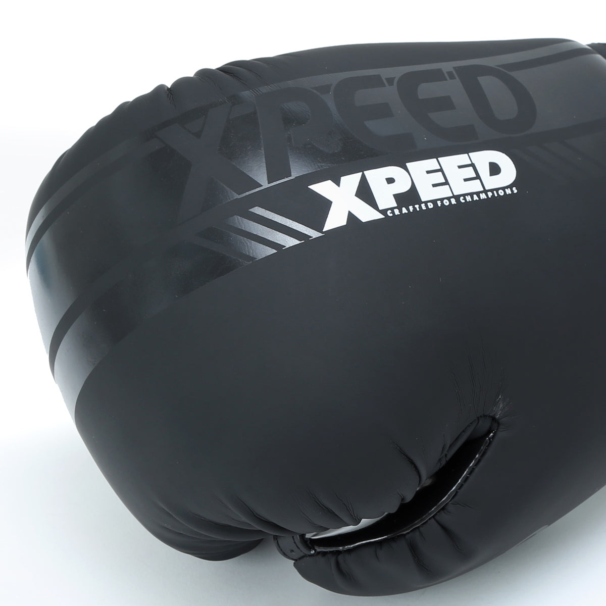 Black Xpeed XP3051 matte PU boxing gloves for professional training and sparring, showing padded wrist support and secure strap.