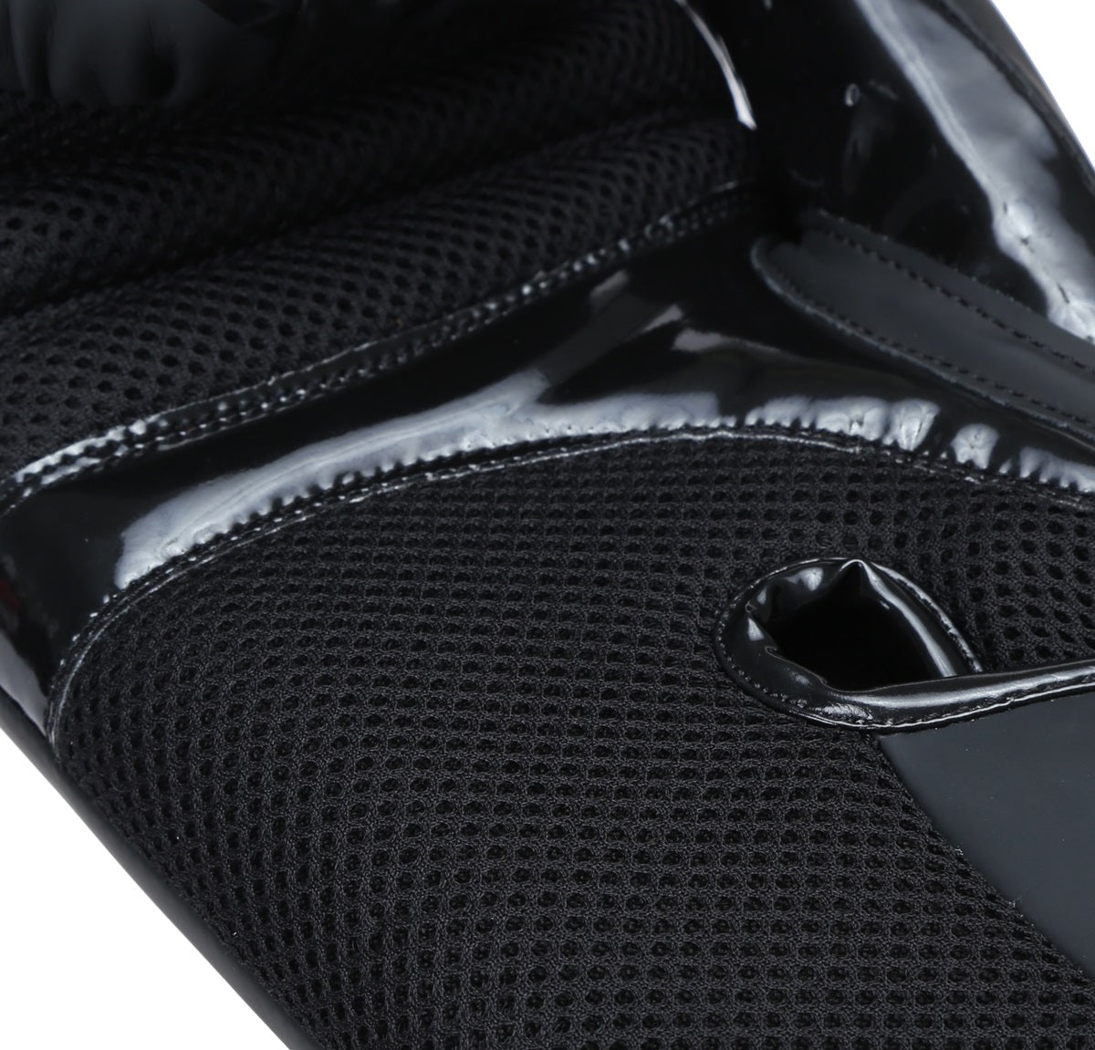 Black matte Xpeed XP3052 boxing glove with padded wrist support and sleek design for training and sparring.