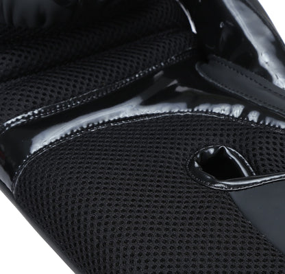 Black matte Xpeed XP3052 boxing glove with padded wrist support and sleek design for training and sparring.