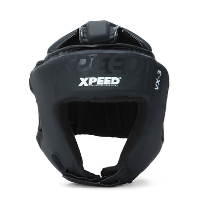 Black matte Xpeed XP3057 headguard, padded protective headgear designed for combat sports, featuring adjustable straps and sleek finish.
