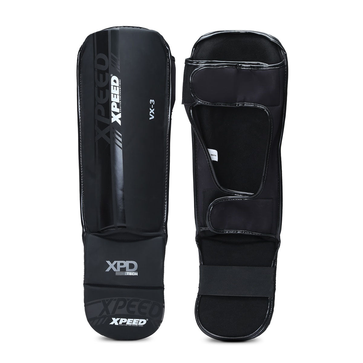 Black Xpeed XP3058 matte PU grappling shinguard showing padded protection and adjustable straps for martial arts training.