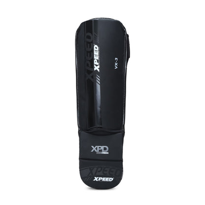 Black Xpeed XP3058 Matt PU grappling shinguard with padded protection and adjustable straps for martial arts training.