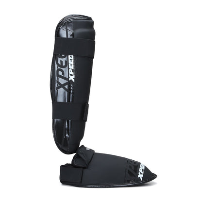 Black matte Xpeed XP3060 Xpeed Matt PU Shinpad with foot, showcasing padded shin protection and adjustable straps.