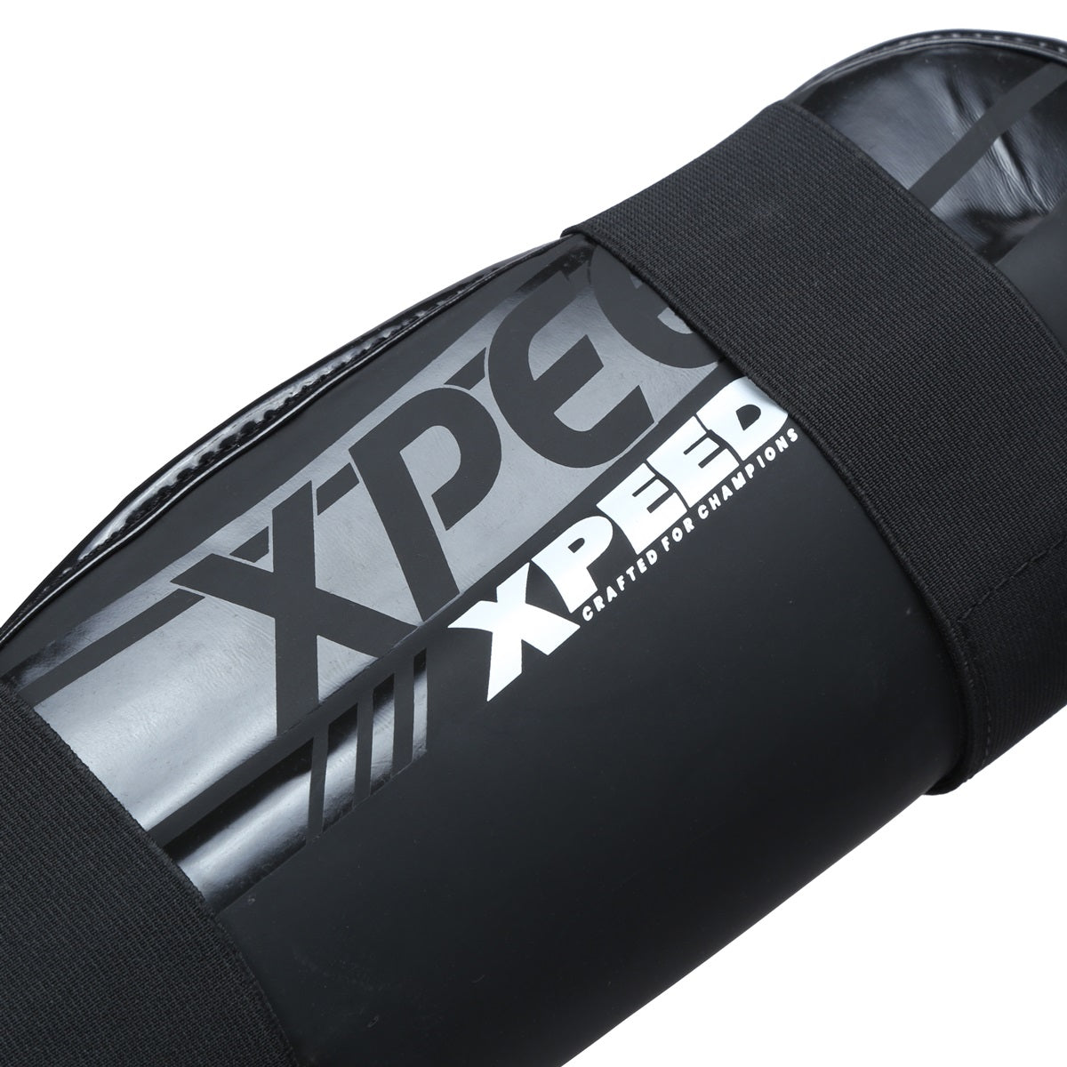 Black Xpeed XP3060 Xpeed Matt PU Shinpad with Foot, protective sports shinpad showing padded design and adjustable straps.