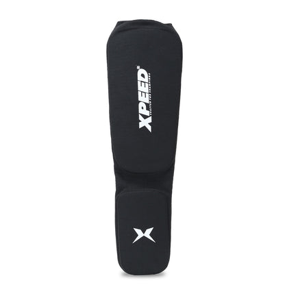 XPEED XP3066 fabric shin guards for martial arts and MMA, showing padded compression design for shin protection.