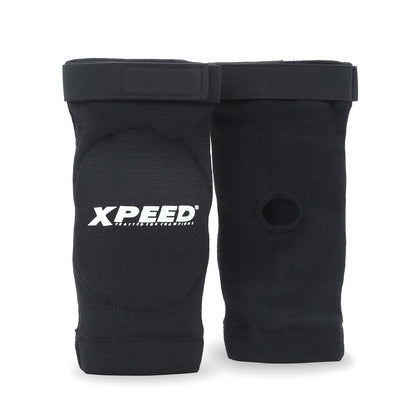 XPEED XP3067 fabric elbow guard with high-density foam support, ideal for gym and MMA training, shown on a model's elbow.