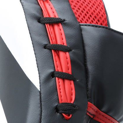 XPEED XP404 curved focus pads with multi-layer foam for boxing and MMA training, shown with padded focus mitts in black and red.