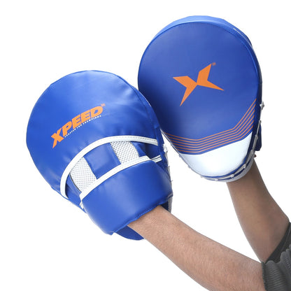 Xpeed XP504 curved focus pads for boxing and martial arts training, showing padded hand targets with curved design