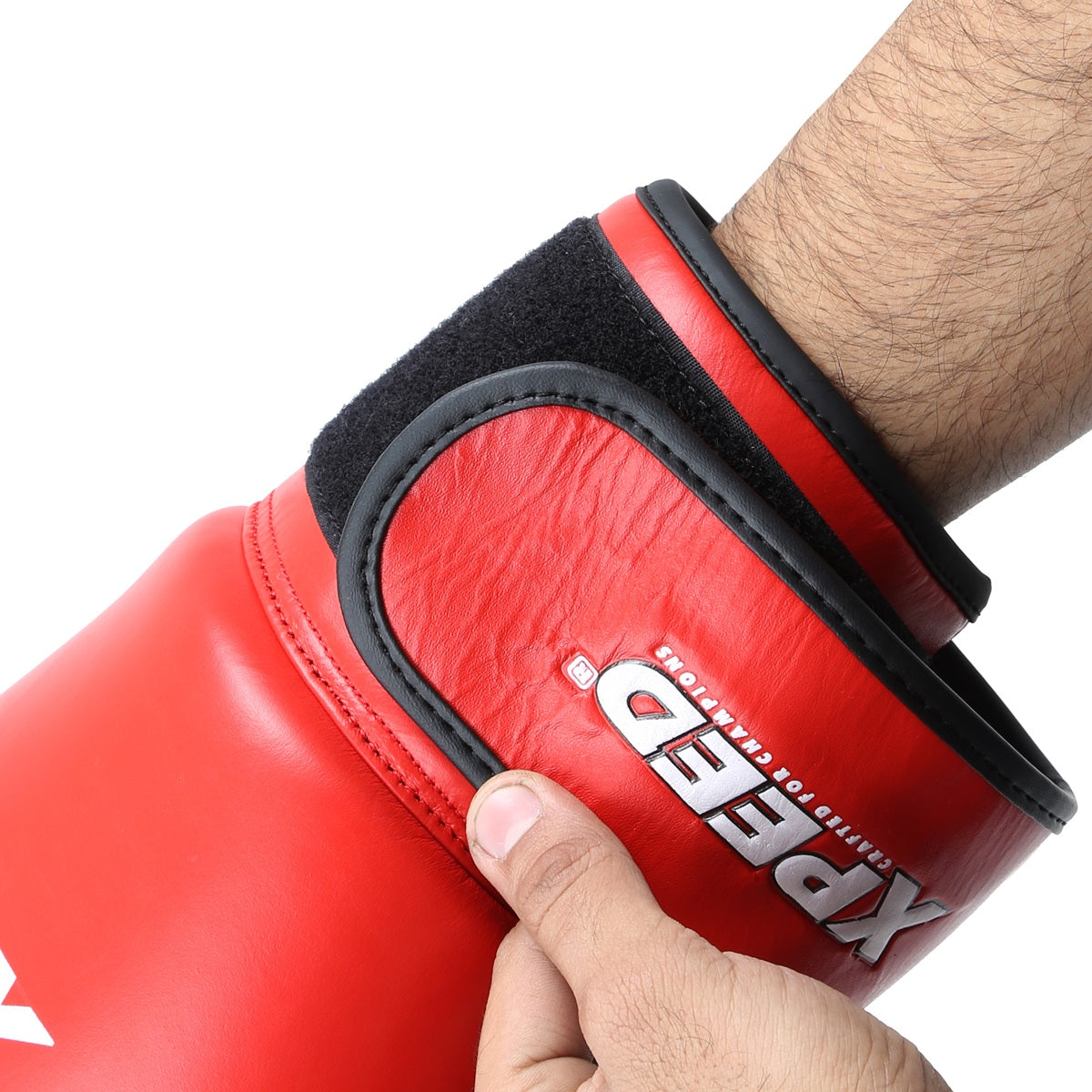 Xpeed XP101 boxing gloves in black with red accents, designed for professional training and competition, BFI approved.