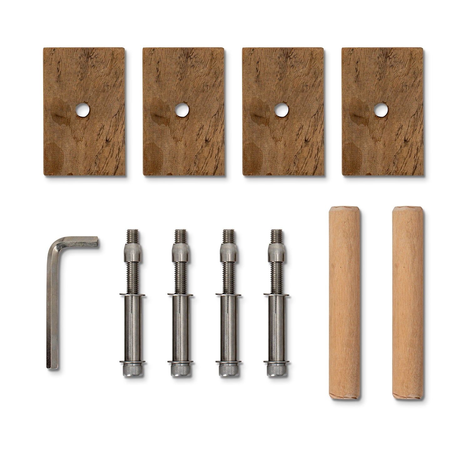 A set of wall anchors and mounting accessories arranged on a white background, including four rectangular wood backplates, four metal anchor bolts, two light wood dowels, and a small L-shaped wrench.